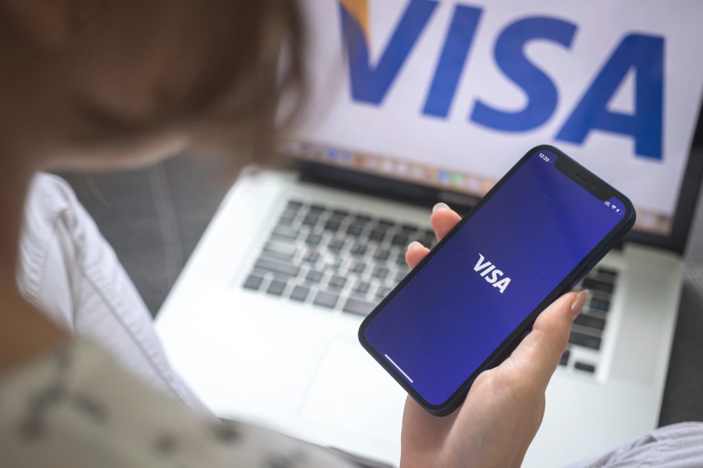 логотип Visa, смартфон, ноутбук