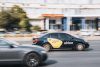 Автомобіль таксі Uklon, дорога, рух, місто